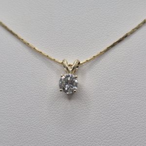 14kt Gold Solitaire Diamond Pendant Featuring a .65ct Round Brilliant Daimond
